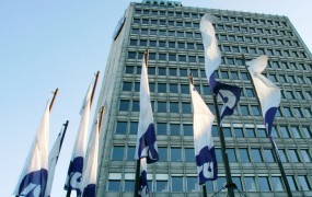 Država od KBC kupuje delež v NLB: delnice po en evro