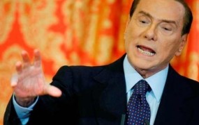 Berlusconiju skrajšali kazen