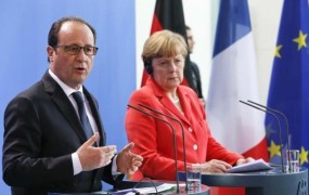 Merklova in Hollande pozivata k enotnemu odzivu EU na migrantsko krizo