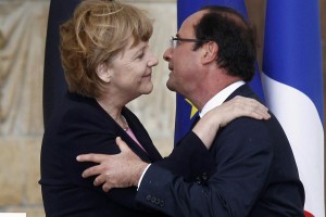 Merklova in Hollande obeležila 50-letnico francosko-nemške sprave