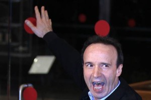 Benigni o vrnitvi Berlusconija v politiko: Bog nam pomagaj