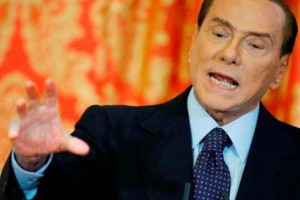 Berlusconiju skrajšali kazen