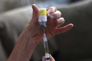 Medicinska sestra s pediatrije je bila cepljena, ošpic se je nalezla od otroka, ki je bil na pregledu