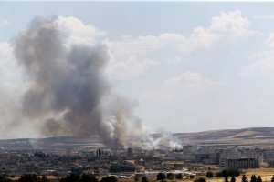 Islamska država v pokolu v Kobaneju ubila več kot 160 civilistov
