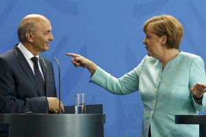 Merklova poziva k zajezitvi vala migrantov z Balkana