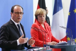 Merklova in Hollande pozivata k enotnemu odzivu EU na migrantsko krizo