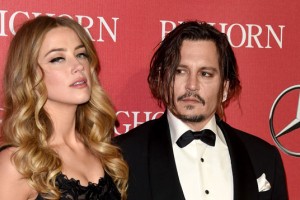 Johnny Depp in Amber Heard se po 15 mesecih ločujeta