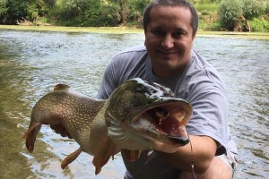 FOTO: Ujeta doslej uradno najdaljša ščuka v reki Krki