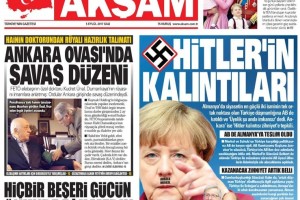 Erdoganov časnik Merklovi narisal Hitlerjeve brčice, jo označil za "Hitlerjeve ostanke"