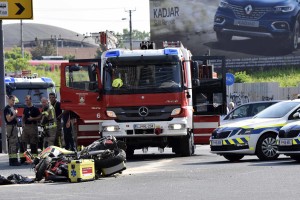 V središču Ljubljane sta trčila reševalec na motorju in osebno vozilo (FOTO)