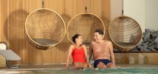 T3_HLP_indoor_pool_senior_couple_05_TheOther_2025_lowres.jpg