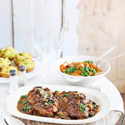 Rich braised beef with melting onions , thyme glazed carrots and peasweekend