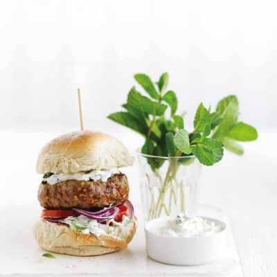 lamb burgers with tzatzikimake it tonighteverydayadditional information:pot of tzatziki on the sidemint leaves in a glass