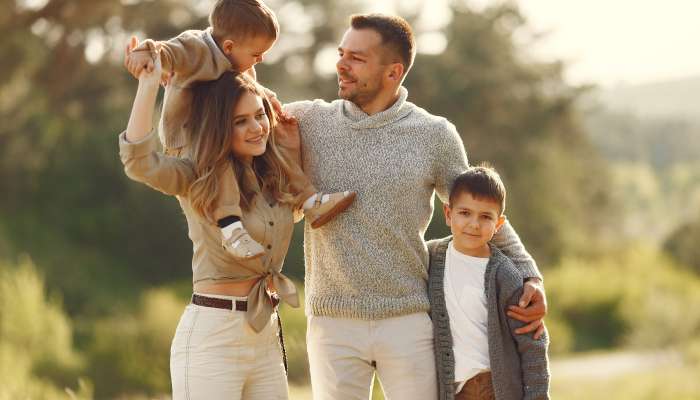 cute-family-playing-summer-field