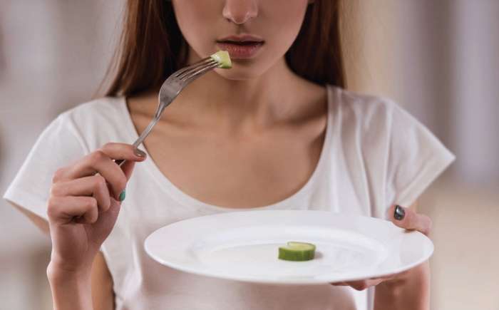 V primežu anoreksije in bulimije
