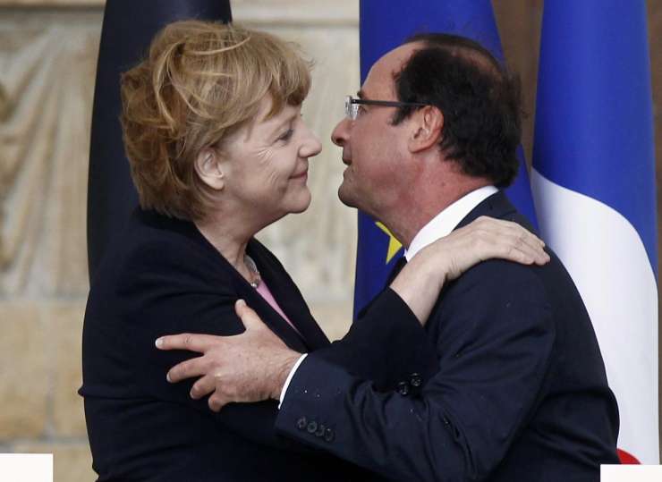 Merklova in Hollande obeležila 50-letnico francosko-nemške sprave