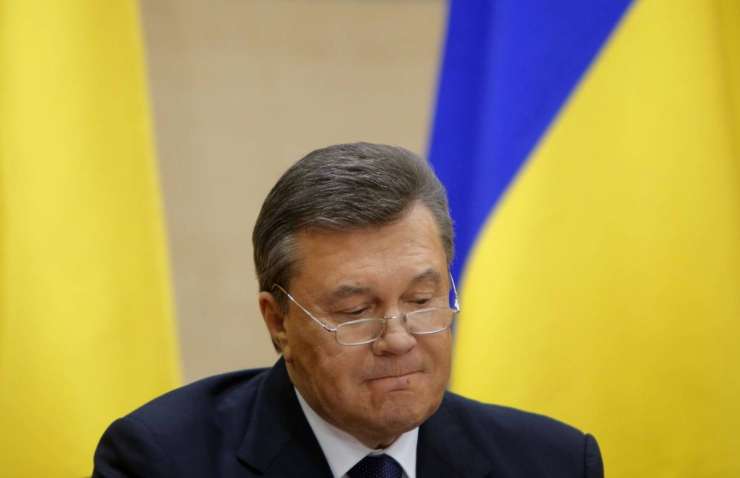 Janukovič iz Rusije: V Kijevu se je zgodil »gangsterski udar«