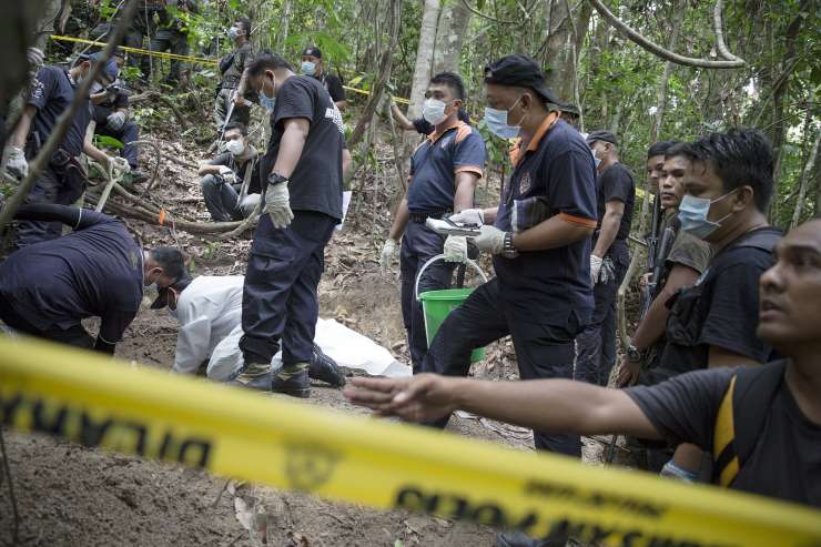 Malezija preiskuje vpletenost policije v grobišča migrantov