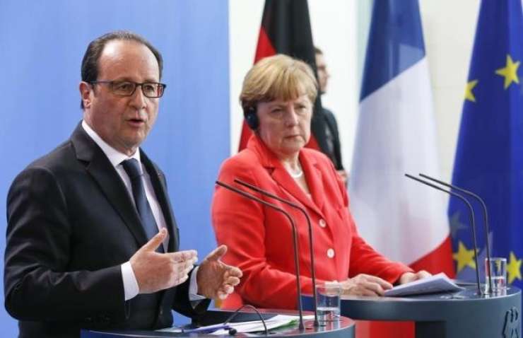 Merklova in Hollande pozivata k enotnemu odzivu EU na migrantsko krizo