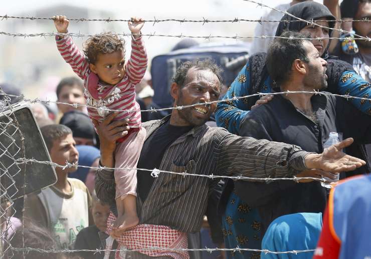 AI obtožuje Turčijo, da sirske begunce prisilno vrača na vojno območje