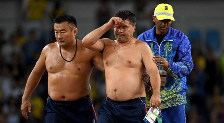 Mongolskima trenerjema za olimpijski striptiz triletni suspenz in 46.000 evrov kazni