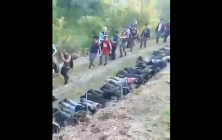 Policija pri Ilirski Bistrici odkrila tabor z okoli 200 migranti; vso noč so jih lovili (VIDEO)