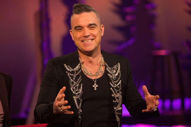 Robbie Williams se je razveselil četrtega otroka