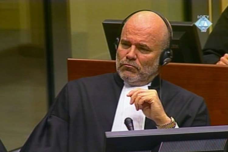 Thacija pred sodiščem v Haagu zastopa ameriški odvetnik Gregory Kehoe, ki je branil tudi hrvaškega generala Anteja Gotovino.