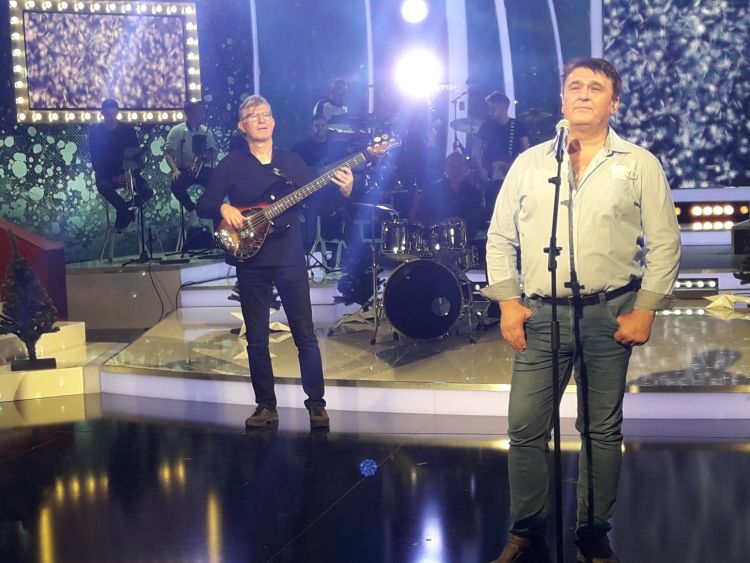 Vanjo Tomc za mikrofonom