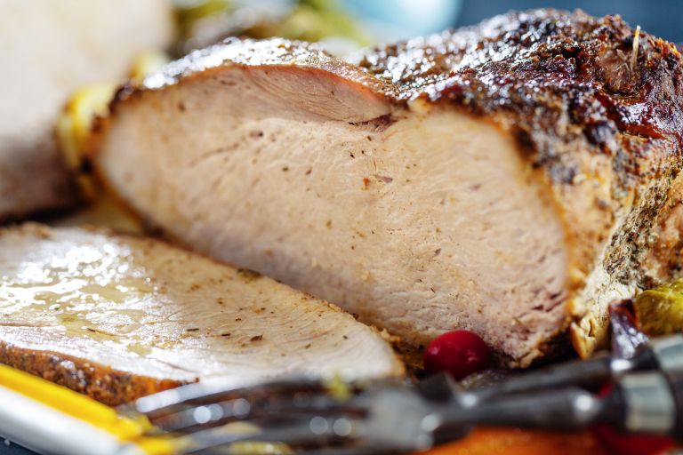 tasty-appetizing-roasted-meat-pork-with-vegetables-christmas-thanksgiving-day-closeup.jpg
