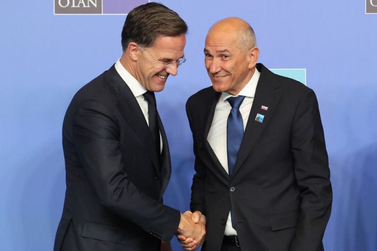 Mark Rutte, janez janša