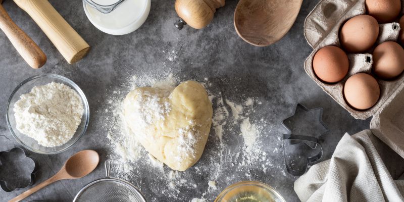 top-view-dough-counter-with-flour-eggs.jpg