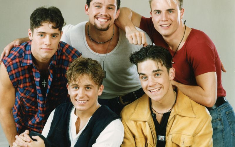 Robbie Williams je začel v skupini Take That