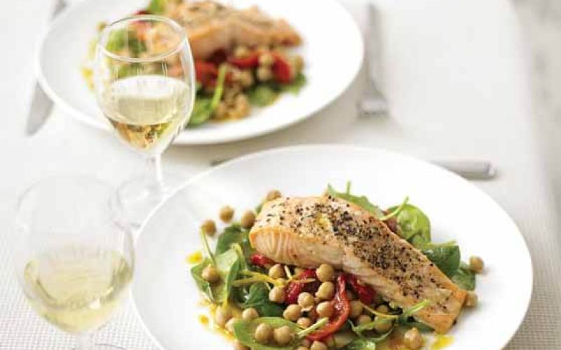 salmon with warm chickpea pepper and spinach salad