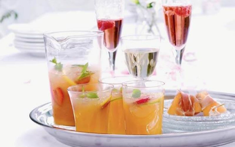citrus peach cooler pink fizz with raspberries cocktails