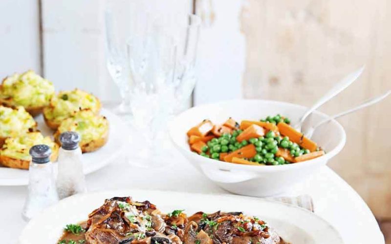 Rich braised beef with melting onions , thyme glazed carrots and peasweekend