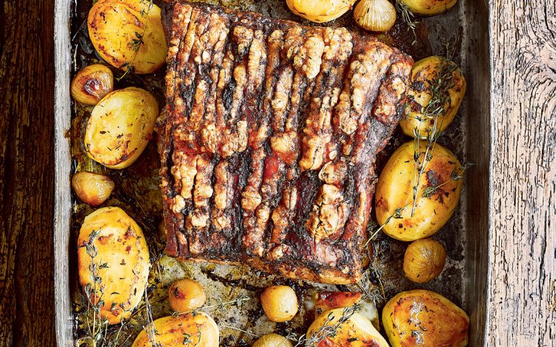 roast pork belly, fondant potatoes and pickled onions