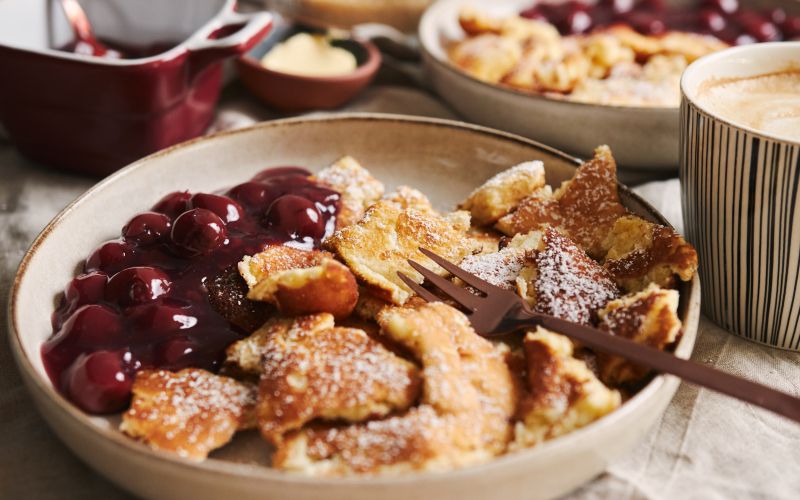 selective-focus-closeup-shot-delicious-fluffy-pancakes-with-cherry-powdered-sugar.jpg