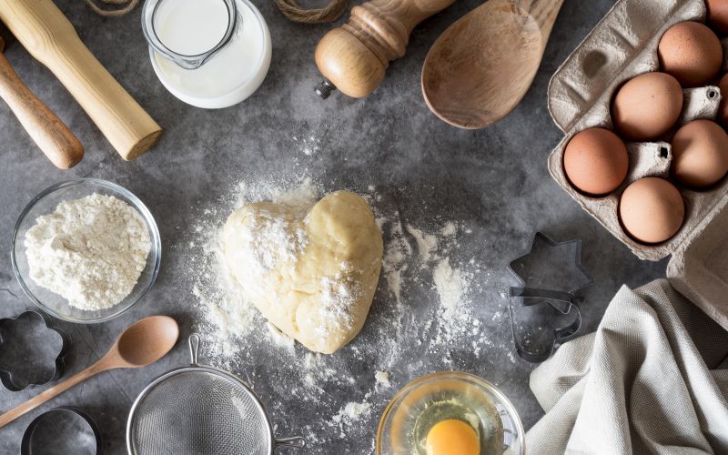top-view-dough-counter-with-flour-eggs.jpg