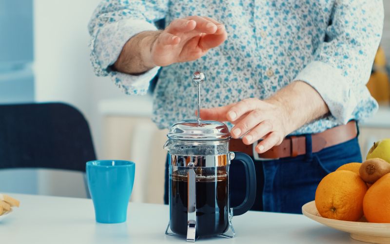 older-man-making-coffee-using-french-press-breakfast-kitchen-elderly-person-morning-enjoying-fresh-brown-cafe-espresso-cup-caffeine-from-vintage-mug-filter-relax-refreshment.jpg