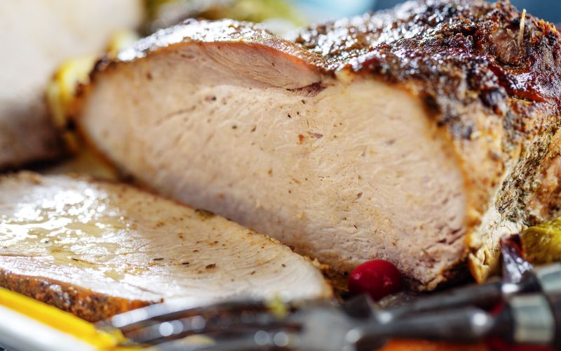 tasty-appetizing-roasted-meat-pork-with-vegetables-christmas-thanksgiving-day-closeup.jpg