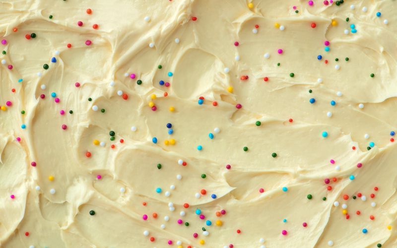 cake-frosting-texture-background-vector-with-sprinkles-top.jpg