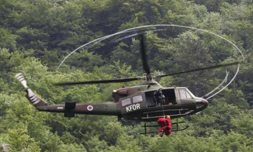 Poškodovanega v gozdu odpeljali s helikopterjem